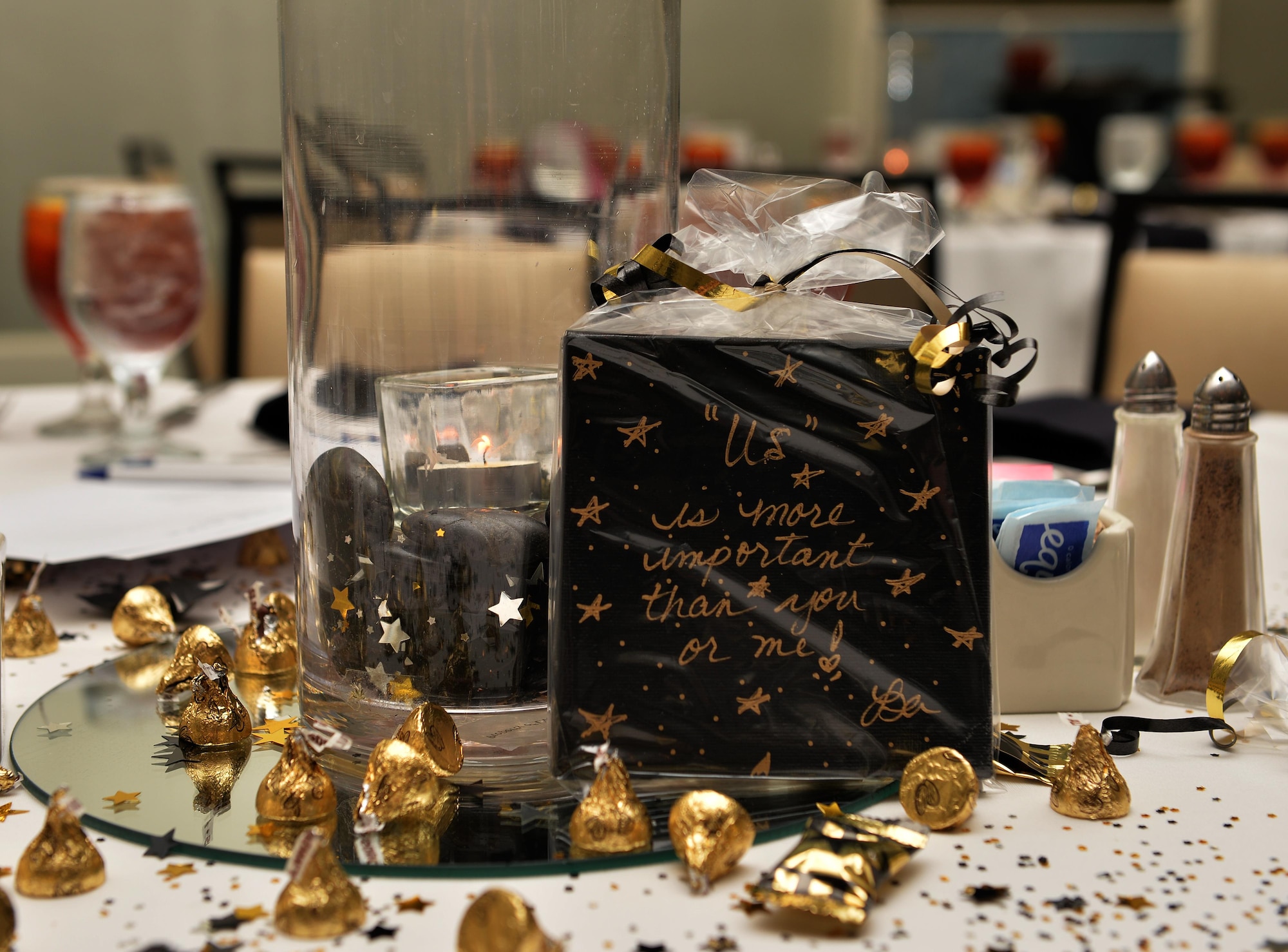 Air Commandos receive a commemorative gift at the 1st Special Operations Wing Chaplain Corps resiliency retreat “Rekindling the Romance Date Night” at the Sandestin Hilton in Miramar Beach, Fla., July 28, 2016. This event was part of the Family Resiliency Pilot Program, relationship enhancements through resiliency retreats. (U.S. Air Force photo by Senior Airman Andrea Posey)