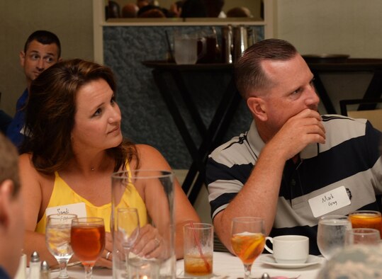 Lt. Col. Mark Gray, commander of the 1st Special Operations Aircraft Maintenance Squadron, and his wife, Sandi, contemplate a trivia question during the 1st Special Operations Wing Chaplain Corps resiliency retreat “Rekindling the Romance Date Night” at the Sandestin Hilton in Miramar Beach, Fla., July 28, 2016. Participants of the event were separated into three teams to compete against each other to win prizes after four rounds of different trivia categories. (U.S. Air Force photo by Senior Airman Andrea Posey)