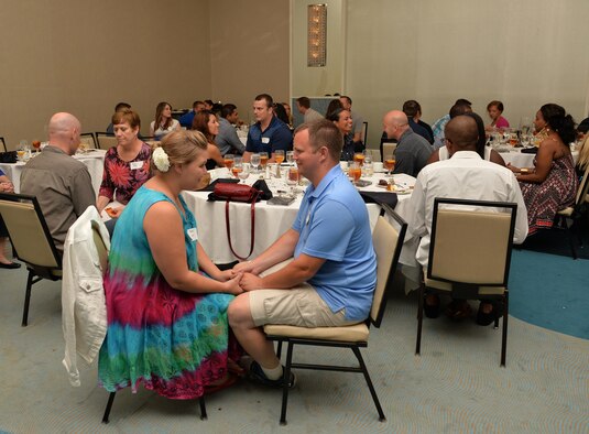 Air Commando couples participate in a communication and connection exercise during the 1st Special Operations Wing Chaplain Corps resiliency retreat “Rekindling the Romance Date Night” at the Sandestin Hilton in Miramar Beach, Fla., July 28, 2016. Couples were encouraged to have appreciative, honest and positive communication with each other during the exercise. (U.S. Air Force photo by Senior Airman Andrea Posey)