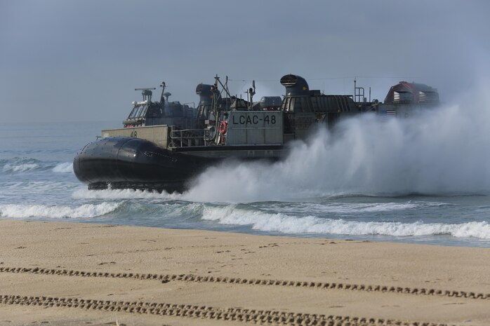 A Landing Craft Air Cushion with Assault Craft Unit 5 approaches the shore during the amphibious assault training portion of a Marine Corps Combat Readiness Evaluation on Camp Pendleton, Calif., August 2, 2016. During a MCCRE, Marines perform various events to determine the combat readiness of the unit. The amphibious assault training was the last event conducted during the week long exercise. (U.S. Marine Corps photo by Lance Cpl. Shellie Hall)