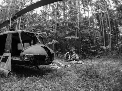 U.S. Army Reserve soldiers with the 246th Quartermaster Company (Mortuary Affairs), Mayaguez, Puerto Rico, removed simulated human remains during a search and recovery mission at a helicopter crash during Mortuary Affairs Exercise 16-02, July 21, at Fort Pickett, Va. MAX 16-02 included all six U.S. Army Reserve Mortuary Affairs units performing search and recovery missions and operating Mortuary Affairs Collection Points and a Theater Mortuary Evacuation Point. The units were evaluated by active-duty mortuary affairs personnel from nearby Fort Lee, Va. (U.S. Army photo by Timothy L. Hale)(Released)