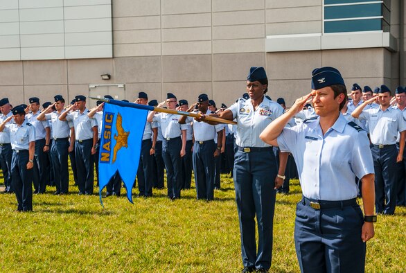 Airmen from the National Air and Space Intelligence Center participate in a retreat ceremony at Wright-Patterson Air Force Base, Ohio, Aug. 1, 2016. Retreat ceremonies serve a twofold purpose to signal the end of the official duty day and to pay respect to our nation's flag. Because the time for the end of the duty day varies, the commander designates the specific time for the retreat ceremony. (U.S. Air force photo/Tech. Sgt. Eunique P. Thomas)