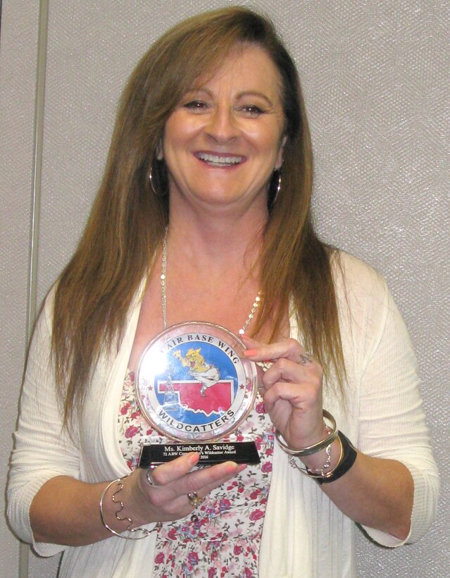 Kimberly Savidge beams when presented her Wildcatter award.