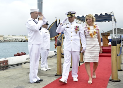 160617-N-LY160-312
JOINT BASE PEARL HARBOR-HICKAM, Hawaii (June 17, 2016) Capt. Craig R. Blakely and wife, Joni, are piped ashore during the Submarine Squadron (SUBRON) 7 change-of-command and retirement ceremony in Joint Base Pearl Harbor-Hickam. Blakely is retiring from active duty after more than 28 years of service. (U.S. Navy photo by Mass Communication Specialist 2nd Class Michael H. Lee)
