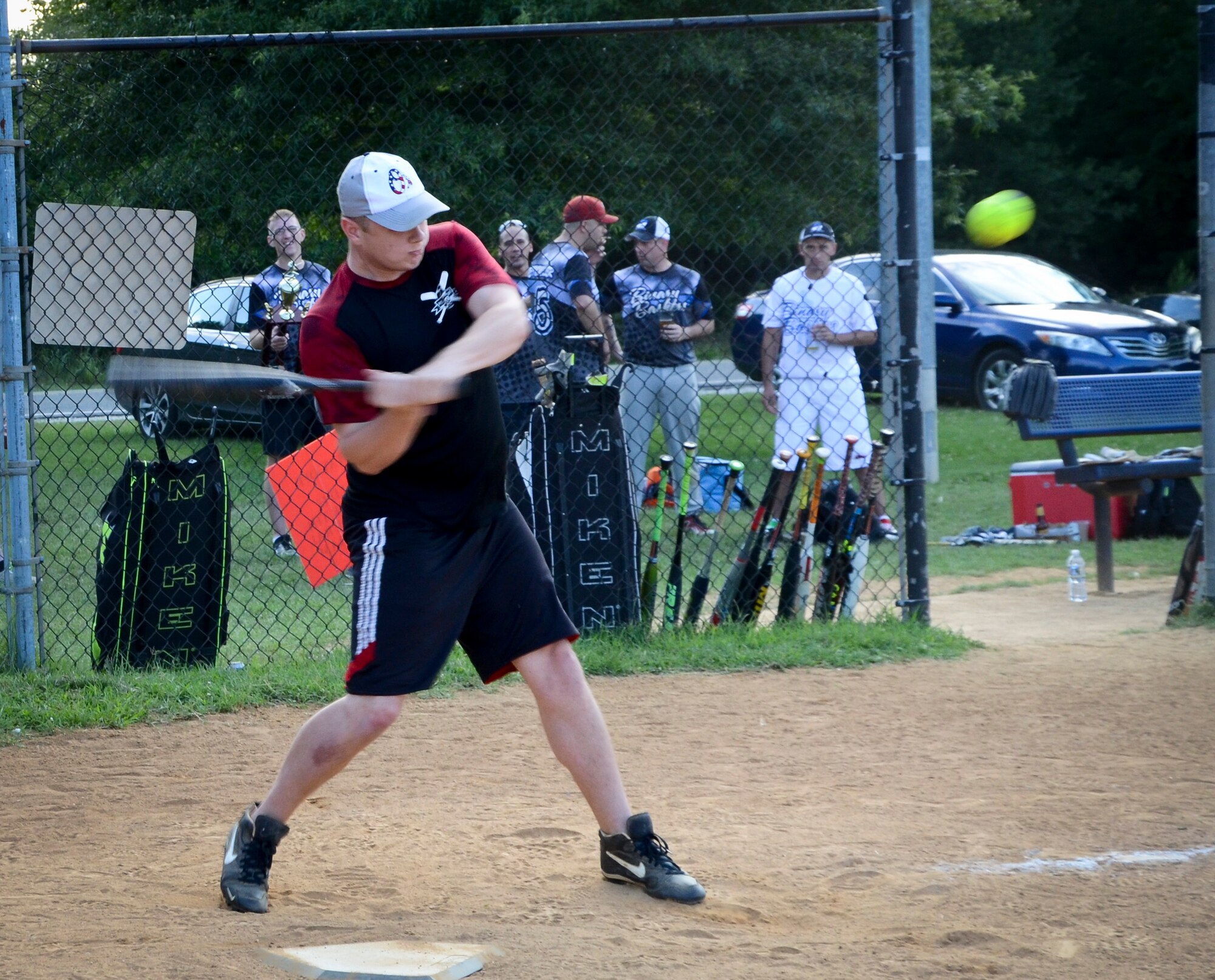 A 34th Intelligence Squadron player swings at a pitch during the Game 1 Division ONE Intramural Softball Championship game against the Navy Information Operations Command, August 3, 2016 at Fort Meade, Md. NIOC won the first game 19 to 9 to force a Game 2 against the 34th IS. (U.S. Air Force photo/Staff Sgt. AJ Hyatt)