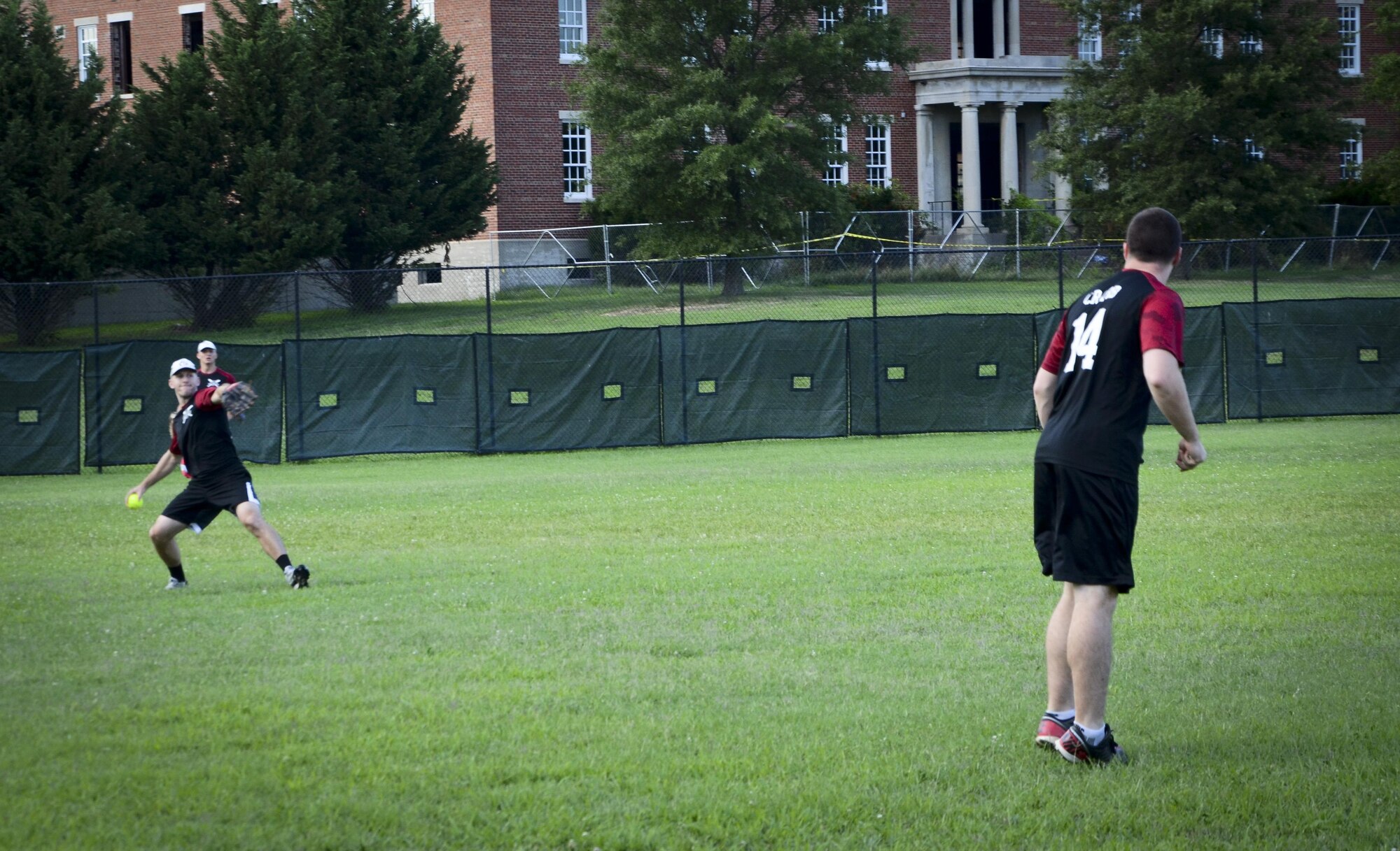 A 34th Intelligence Squadron outfielder winds up for a throw to 2nd base during the Game 1 Division ONE Intramural Softball Championship game against the Navy Information Operations Command, August 3, 2016 at Fort Meade, Md. NIOC won the first game 19 to 9 to force a Game 2 against the 34th IS. (U.S. Air Force photo/Staff Sgt. AJ Hyatt)