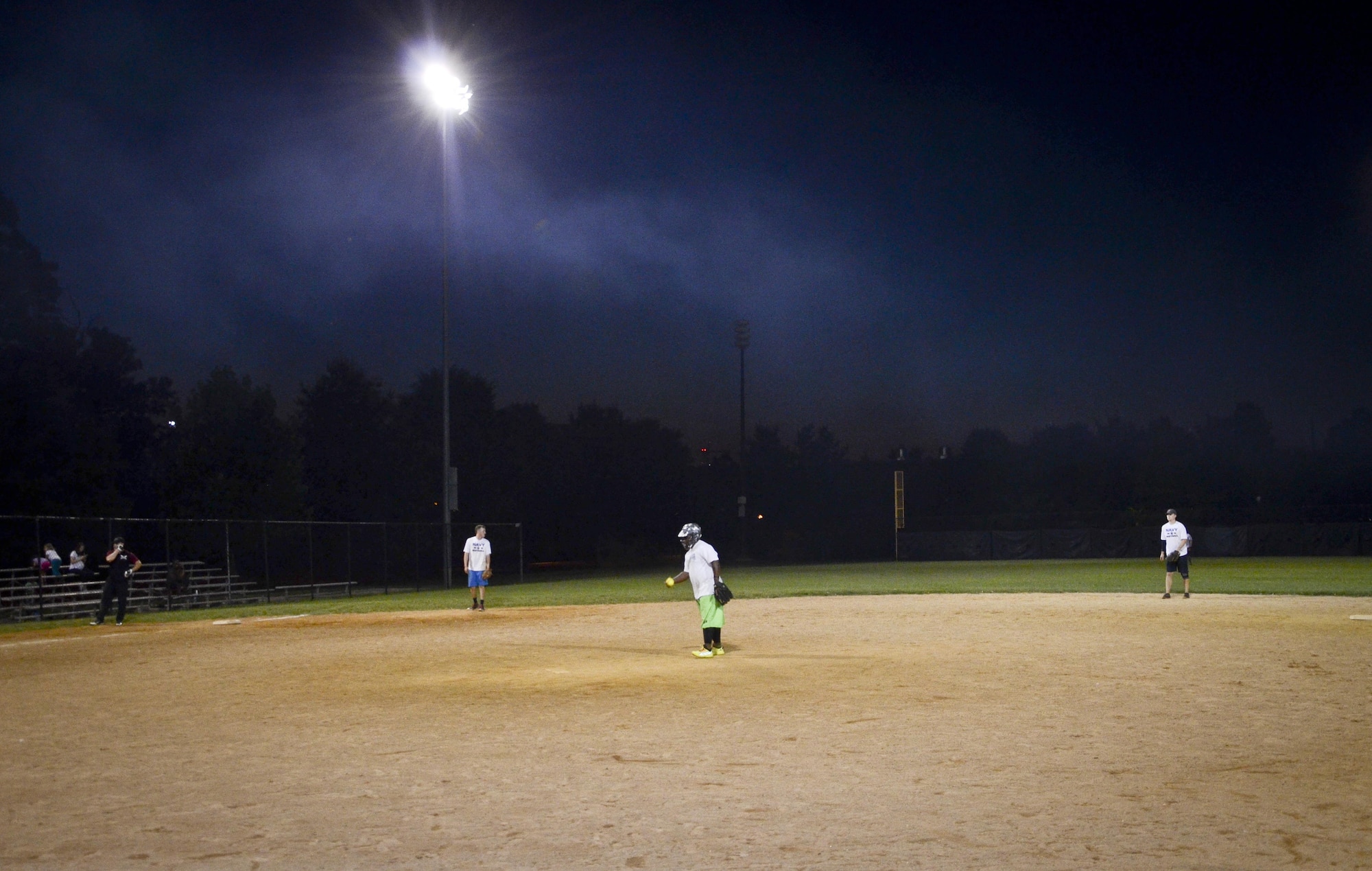 The Navy Information Operations Command defense gets ready for the 5th inning during the Game 2 Division ONE Intramural Softball Championship game against the 34th Intelligence Squadron, August 3, 2016 at Fort Meade, Md. The 34th IS went on to win the Championship game 31 to 25. (U.S. Air Force photo/Staff Sgt. AJ Hyatt)