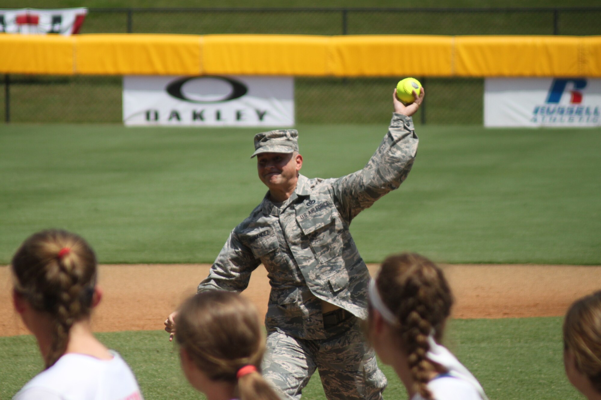 Base Wing command chief, showed off his skills on the mound Sunday, as he delivered the ceremonial first pitch at the North Carolina vs. Tennessee Little League Southeastern
Region Softball Tournament game.

North Carolina won the game 9-2 and went on to win the championship game against Virginia to advance to the Little League Softball World Series.

The Little League Southeastern Region Baseball Tournament begins today. For more information, visit
http://www.eteamz.com/llbsouth/news/index.cfm?cat=894070.