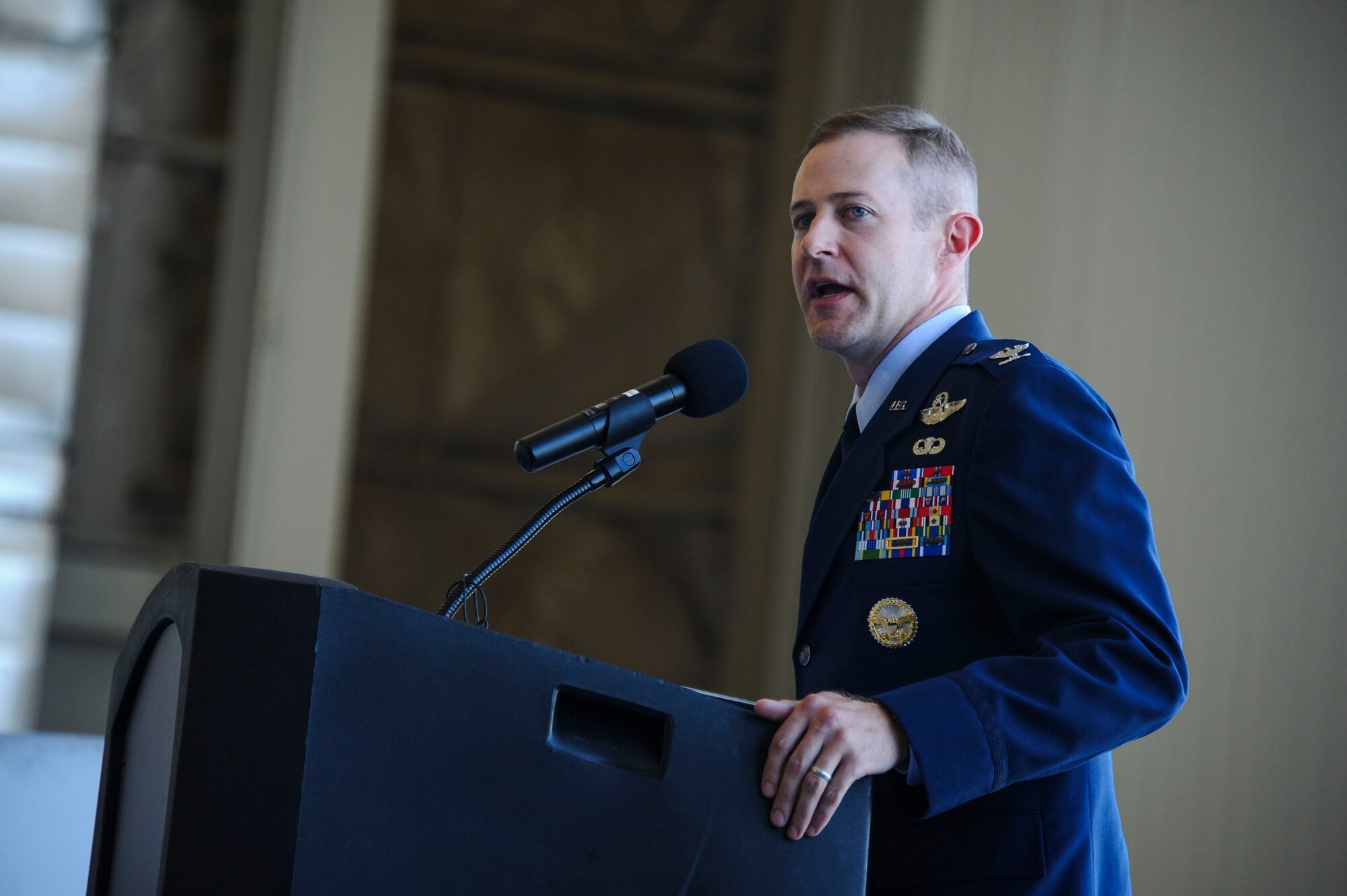 U.S. Air Force Col. Scott Campbell makes his first remarks after assuming command of the 355th Fighter Wing during a change of command ceremony at Davis-Monthan Air Force Base, Ariz., Aug. 5, 2016. Campbell is a command pilot with more than 3,200 hours in the T-34, T-38, A-10 and MQ-9. (U.S. Air Force photo by Airman 1st Class Mya M. Crosby)