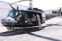 Air Force Gen. Lori J. Robinson (center), commander of NORAD and U.S. Northern Command, receives an aerial tour of the greater El Paso, Texas, regional area, July 20, 2016. The El Paso Air Branch provided the general with a tour of the international border, downtown El Paso, Fort Hancock, Texas, and Santa Teresa, N.M.

