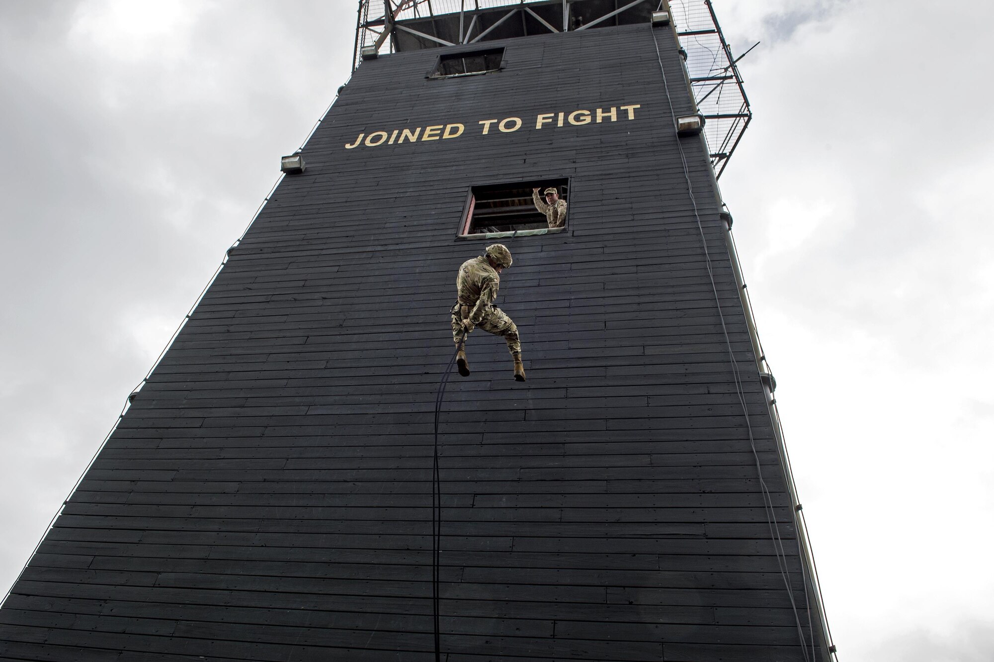 U.S. Air Force Staff Sgt. Tyler Hodge, 820th Combat Operations Squadron communications technician, demonstrates proper rappel techniques to 93d Air Ground Operations Wing leadership, Aug. 5, 2016, at Moody Air Force Base, Ga. Hodge demonstrated the proper way to execute a rappelling maneuver in preparation for 93d AGOW leadership to try. (U.S. Air Force photo by Airman 1st Class Janiqua P. Robinson)