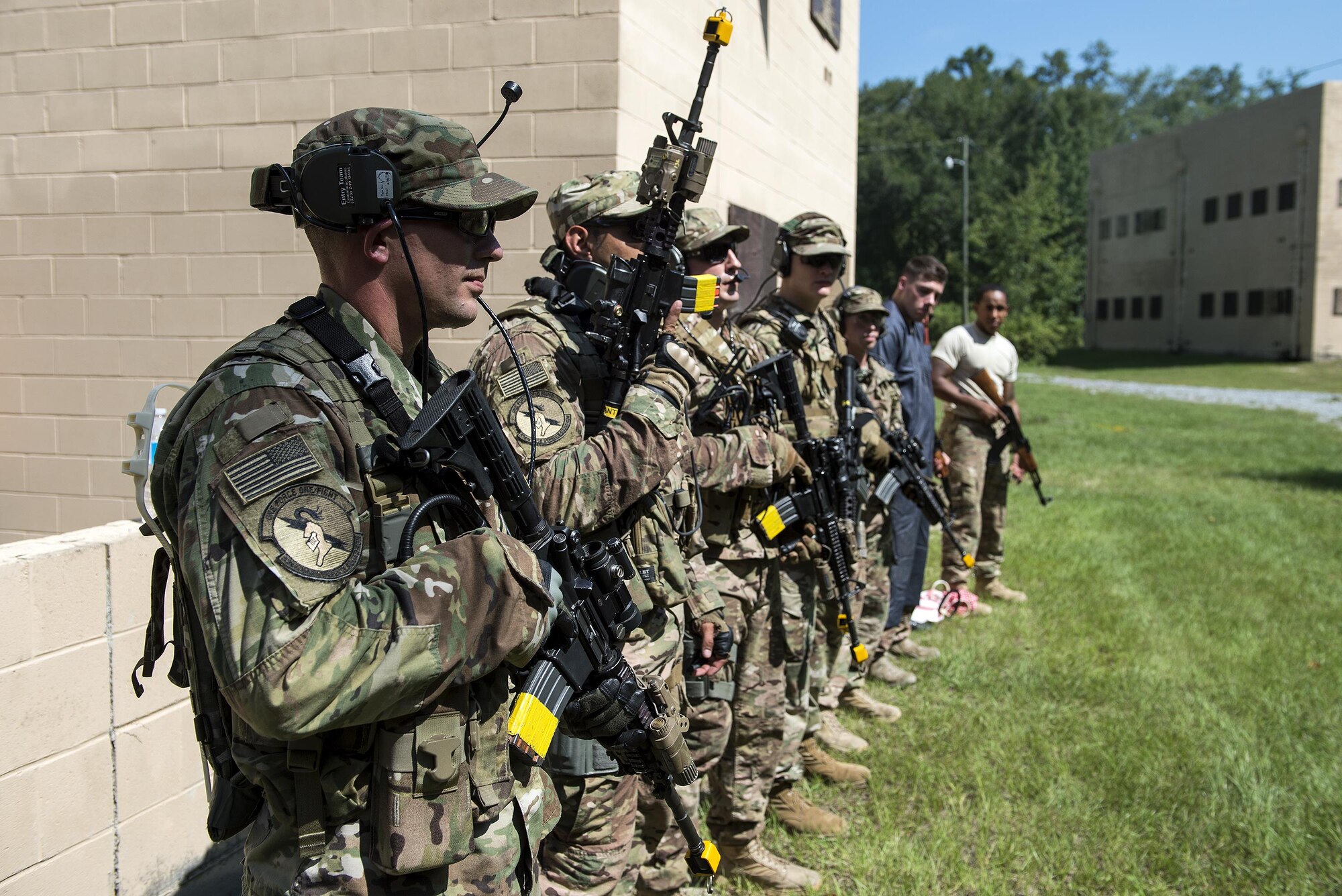 U.S. Air Force Airmen from Moody’s Special Reaction Team listen to remarks from Col. Jeffery Valenzia, 93d Air Ground Operations Wing commander, during an immersion, Aug. 3, 2016, at Moody Air Force Base, Ga. Air Force leadership often spend time within the units and squadrons they lead to learn more about what they do and build a rapport with the Airmen. (U.S. Air Force photo by Airman 1st Class Janiqua P. Robinson)