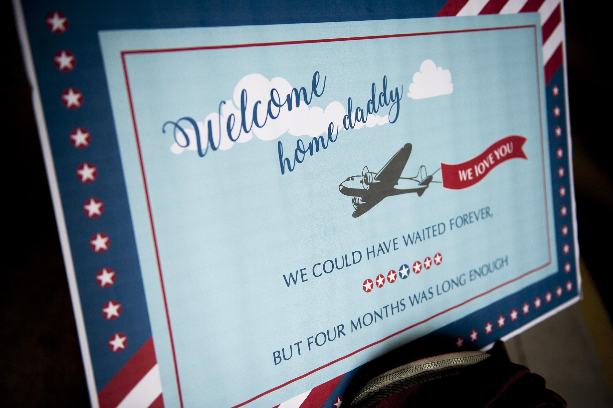A sign rests on a stroller, before Airmen from the 23d Wing return home, Aug. 5, 2016, at Moody Air Force Base, Ga. Approximately 50 Airmen returned from a four-month deployment supporting operations in the horn of Africa. (U.S. Air Force photo by Airman Daniel Snider)
