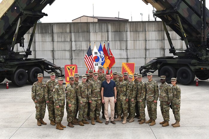 The Secretary of the Army, Mr. Eric Fanning, smiles with Soldiers assigned to 35th Air Defense Artillery Brigade and Republic of Korea -- Army at Osan Air Base, Aug. 2. Fanning toured the D Battery, 6-52 ADA Battalion Patriot site as part of his 12-day Pacific Rim tour. His visit to 35th ADA included a reload drill, air battle management inside an engagement control station, and an interview with local media.