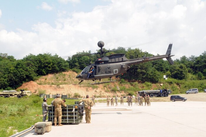 Secretary of the Army Eric Fanning gives the thumbs up as he takes off in one of the Army's last operational OH-58 Kiowa helicopters with 2nd Infantry Division/ROK-US Combined Division rotational 1st Squadron, 17th Calvary Regiment, 82nd Airborne Division, on Rodriguez Live Fire Complex, South Korea, Aug. 3, 2016. The experience was one of several that 2ID/RUCD rotational Soldiers provided the Secretary during his stop on the peninsula as part of his first tour across the Pacific while in office.