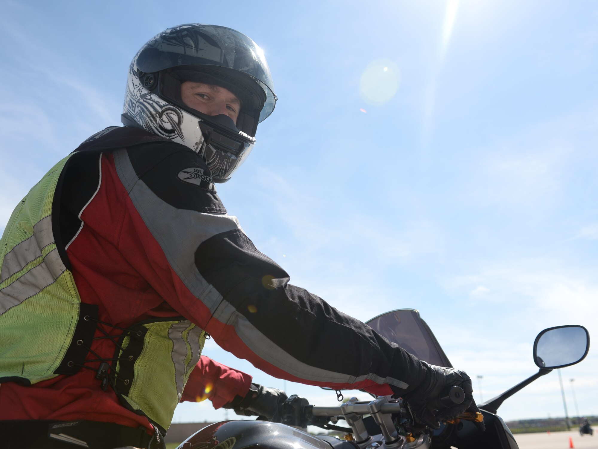 Senior Master Sgt. Gordon Comerford, 28th Munitions Squadron flight chief and motorcycle safety course instructor, prepares to lead other riders participating in a motorcycle safety course sanctioned by the Motorcycle Safety Foundation at the Pride Hangar at Ellsworth Air Force Base, S.D., May 20, 2016. All personnel who ride a motorcycle on base are required to wear a Department of Transportation approved helmet, long sleeve shirt, gloves, pants and boots that cover their ankles. (U.S. Air Force photo by Airman 1st Class Sadie Colbert)