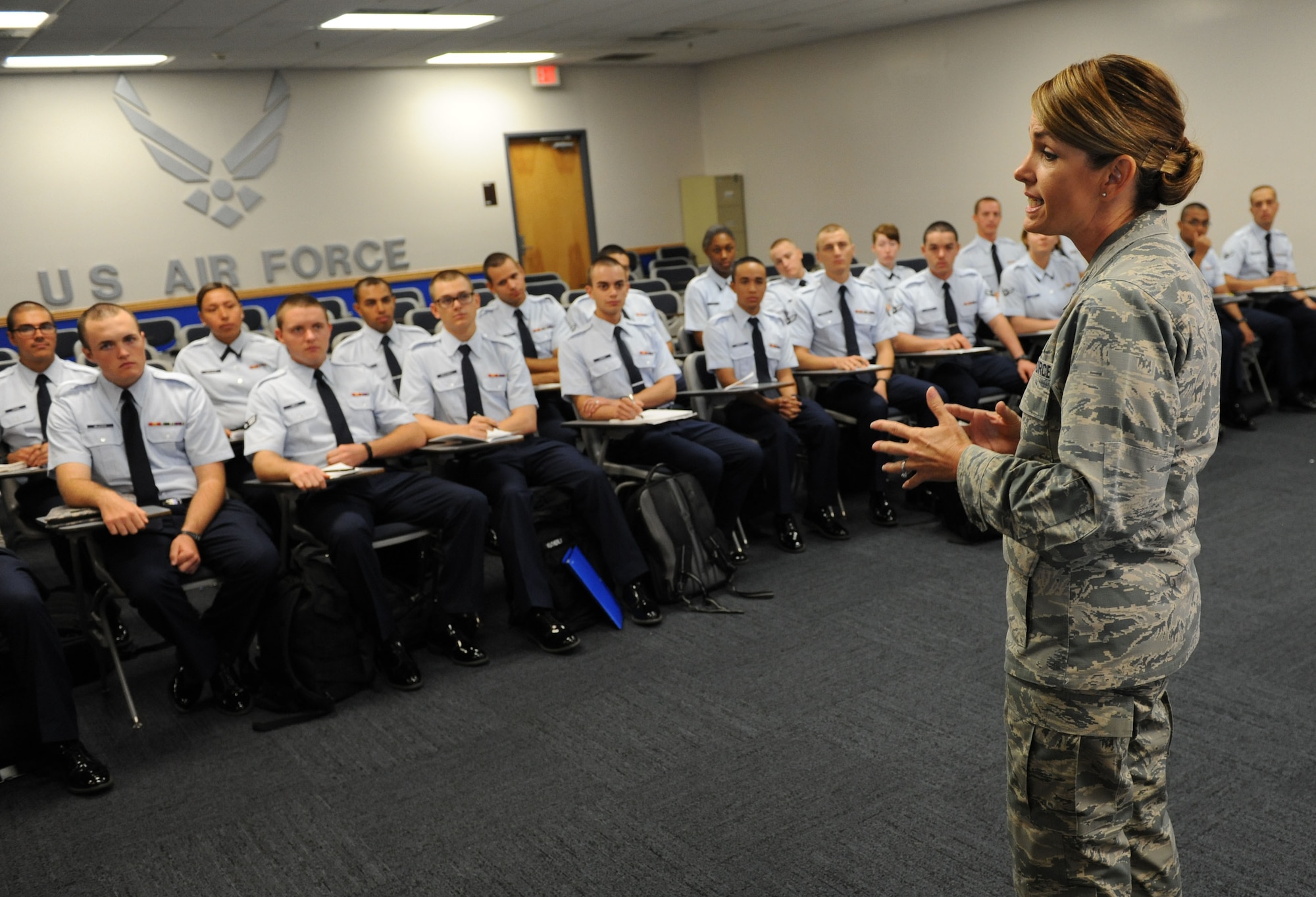 Col. Michele Edmondson, 81st Training Wing commander, welcomes non-prior service Airmen to Keesler during their in-processing at the Levitow Training Support Facility July 2, 2016, on Keesler Air Force Base, Miss. Base leadership welcomes the new Airmen every Tuesday upon their arrival from enlisted basic military training at Lackland Air Force Base, Texas. (U.S. Air Force photo by Kemberly Groue/Released) 