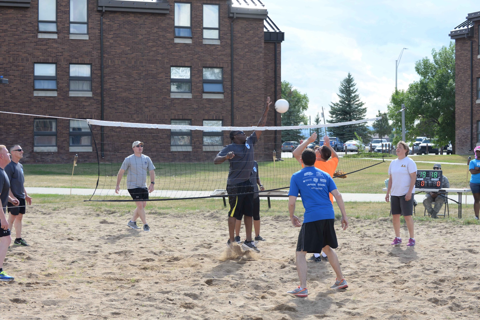 Chief master sergeants and squadron commanders assigned to the 28th Bomb Wing compete in a volleyball tournament during a Summer Bash at Ellsworth Air Force Base, S.D., July 29, 2016. During the event, approximately 200 Airmen listened to music, participated in games and received a free meal, courtesy of the first sergeants. (U.S. Air Force photo by Airman 1st Class Sadie Colbert)