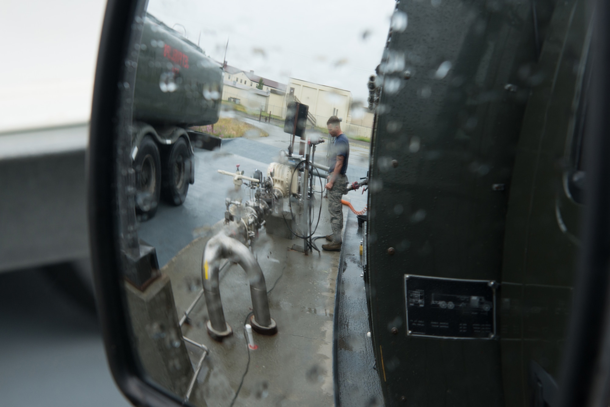 Senior Airman Levi Roark, 673d Logistics Readiness Squadron, fuels distribution journeyman refills an R11 fuel truck on the Joint Base Elmendorf-Richardson flightline, July 22. To ensure maximum readiness, the trucks must be refilled after every fill, regardless of total content.