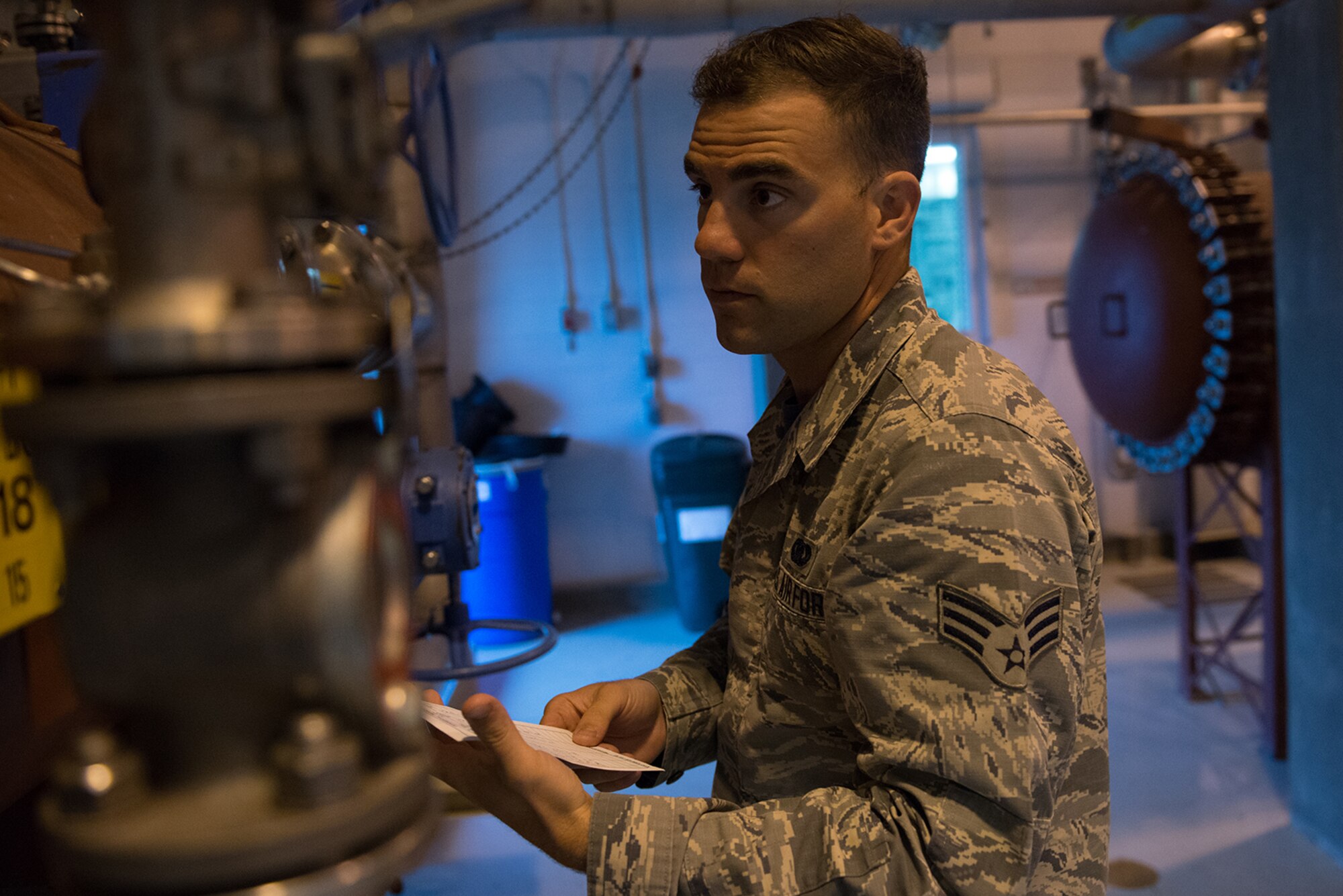 Senior Airman Levi Roark, 673d Logistics Readiness Squadron, fuels distribution journeyman inspects the filter separator at a fuel pump house on the Joint Base Elmendorf-Richardson flightline, July 22. The filter separator removes water and sediment from fuel as it passes through. 