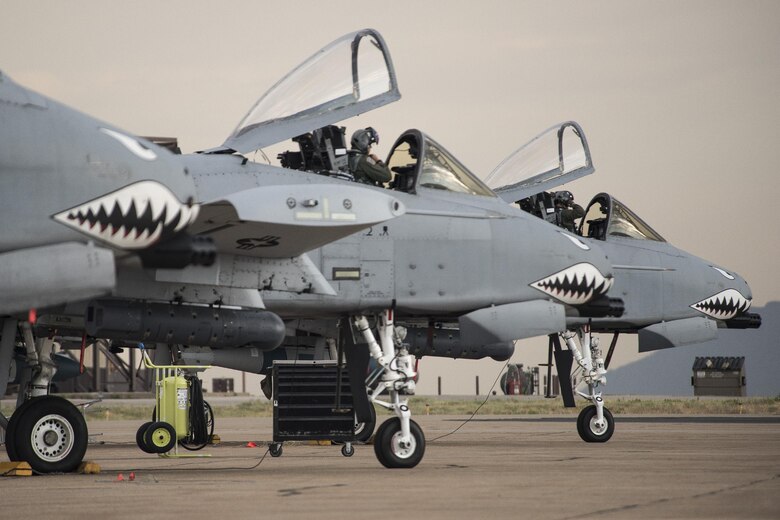 A-10 Thunderbolt II aircraft pilots from Moody Air Force Base, Ga., prepare for flight Aug. 3 at Hill AFB. Moody Airmen and aircraft are at Hill participating in a combat exercise known as Combat Hammer. The exercise evaluates the performance of precision weapons and measures their suitability for use in combat. (U.S. Air Force photo by Paul Holcomb)