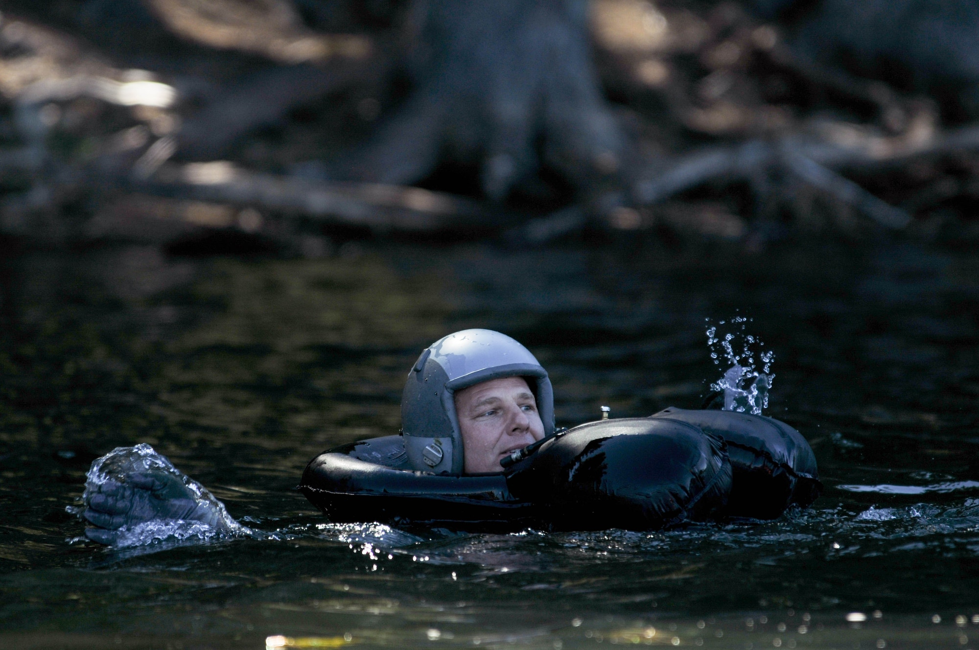 Oregon Air National Guard Maj. Ryan Bocchi, 114th Fighter Squadron pilot, swims to shore during water survival training at Lake of the Woods near Klamath Falls, Ore., July 22, 2016. Aircrew Flight Equipment members helped Kingsley’s F-15 pilots, providing water survival training in the event of an emergency ejection. (U.S. Air National Guard photo by Staff Sgt. Penny Snoozy)