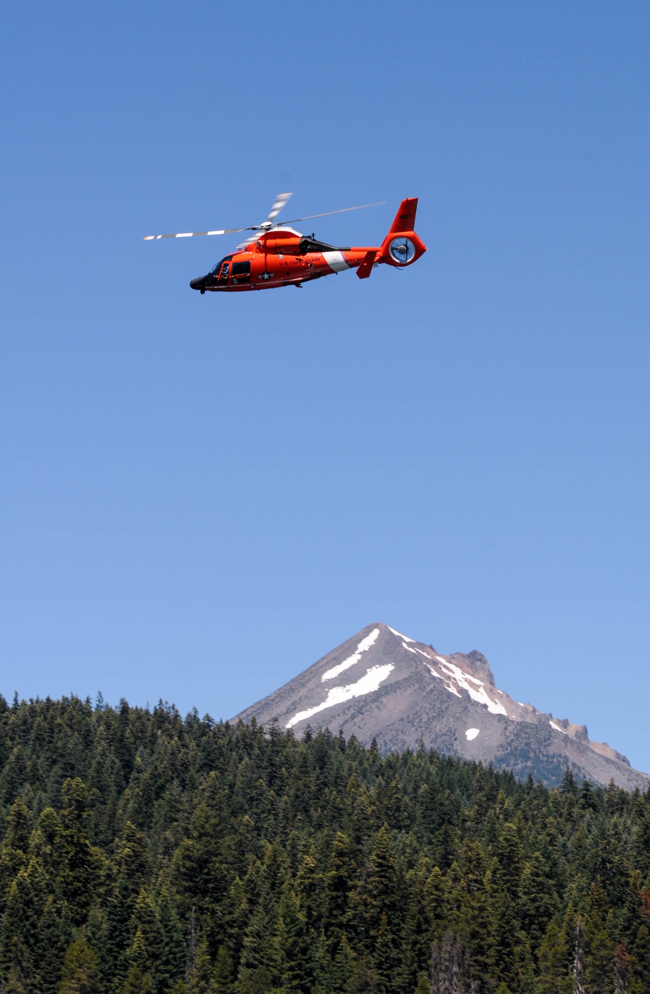Members from Coast Guard Sector North Bend depart for refueling after completing water survival training at Lake of the Woods near Klamath Falls, Ore., July 22, 2016. Aircrew Flight Equipment members joined with Klamath County Sheriff's Department agencies and members of the Coast Guard Sector North Bend to provide Kingsley’s F-15 pilots water survival training in the event of an emergency ejection. (U.S. Air National Guard photo by Staff Sgt. Penny Snoozy)