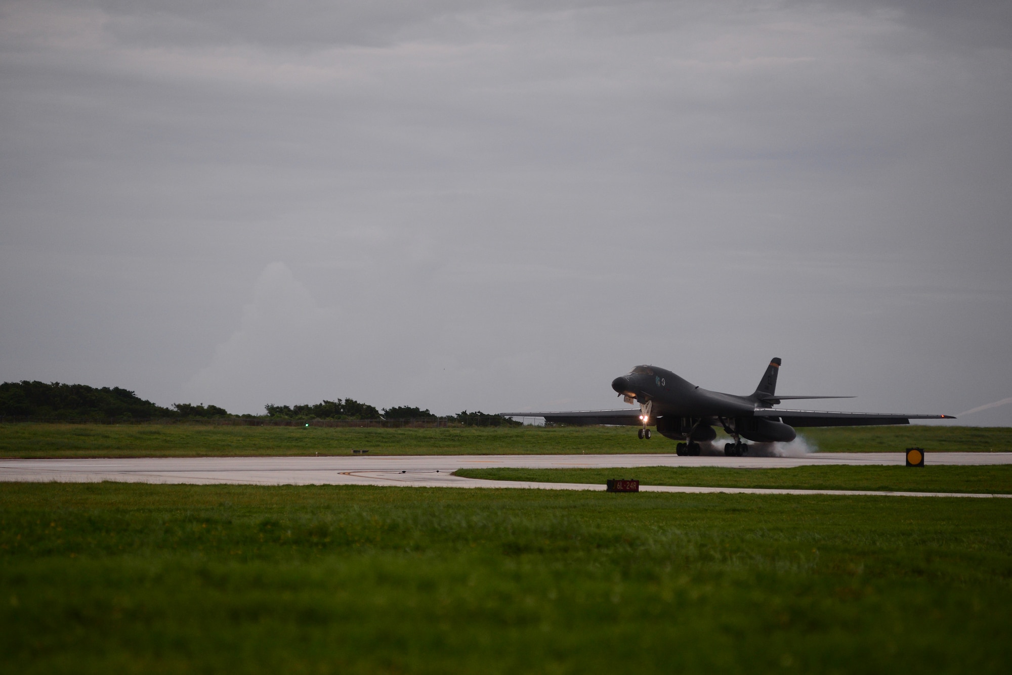 A B-1B Lancer assigned to the 34th Expeditionary Bomb Squadron, deployed from Ellsworth Air Force Base, S.D., lands on the flightline Aug. 6, 2016, at Andersen AFB, Guam. The B-1s last participated in the U.S. Pacific Command’s Continuous Bomber Presence mission approximately 10 years ago and are returning to support USPACOM in conducting routine, strategic deterrence and regional training missions. (U.S. Air Force photo/Airman 1st Class Jacob Skovo)