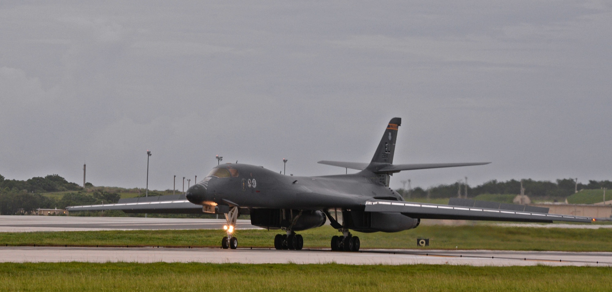 A B-1B Lancer assigned to the 34th Expeditionary Bomb Squadron, deployed from Ellsworth Air Force Base, S.D., lands Aug. 6, 2016, at Andersen AFB, Guam. The B-1s last participated in the U.S. Pacific Command’s Continuous Bomber Presence mission approximately 10 years ago and are returning to support USPACOM in conducting routine, strategic deterrence and regional training missions. (U.S. Air Force photo by Senior Airman Joshua Smoot)