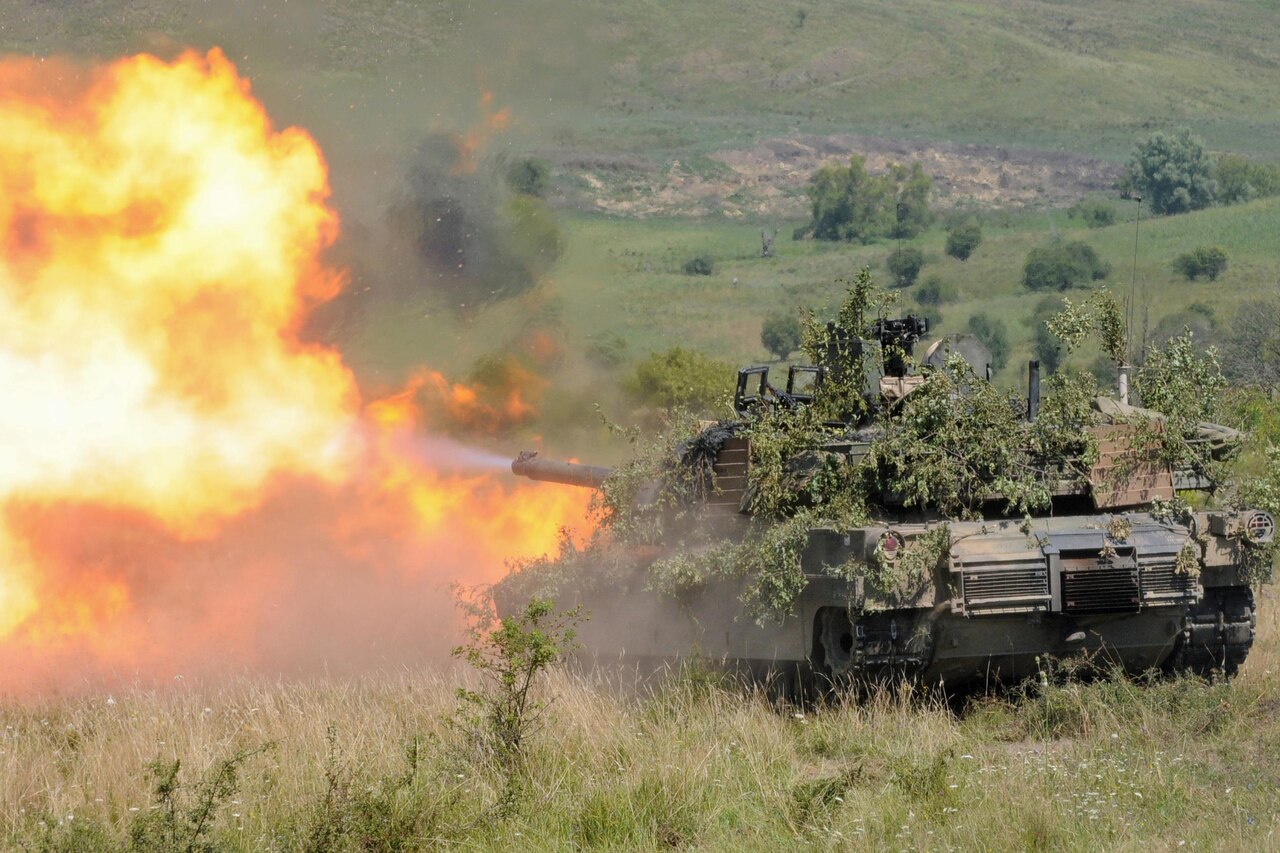 An Abrams tank fires a round during the multinational exercise Saber Guardian 16 near Cincu, Romania, Aug. 6, 2016. The tank belongs to Delta Company, 1st Combined Arms Battalion, 64th Armor Regiment, 1st Armored Brigade Combat Team, 3rd Infantry Division.
Approximately 2800 military personnel from 10 nations are taking part in Saber Guardian. Army photo by Staff Sgt. Corinna Baltos