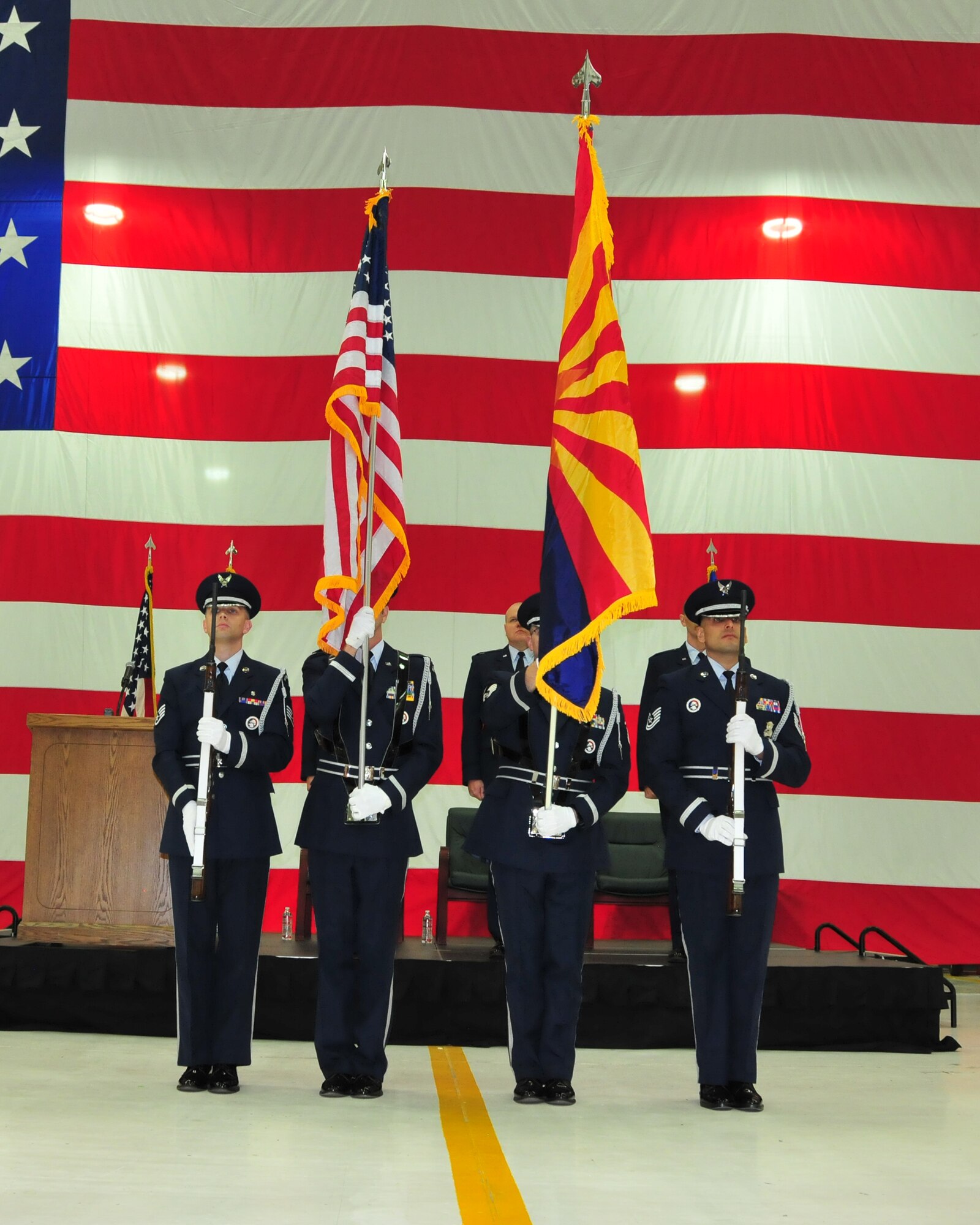 Members of the 161st Air Refueling Wing Color Guard prepare to post the colors during the wing’s change of command ceremony at Phoenix Sky Harbor Air National Guard Base, Dec. 5. The change of command ceremony is rooted in military history, dating back to the 18th century. (U.S. Air National Guard photo by Master Sgt. Kelly Deitloff)