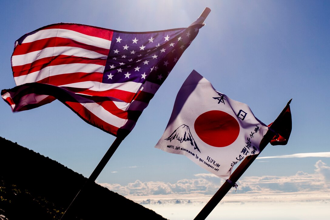 U.S. Marines with Marine Wing Support Squadron (MWSS) 171, based out of Marine Corps Air Station Iwakuni, hiked up Mount Fuji, Japan, as part of a unit activity July 31, 2016. Marines within the squadron first conquered Mount Fuji with a 3,776 meter climb to the peak. Marines bought ‘Kongo-Tsue’ walking sticks and had stamps burned onto them, which signified the location and altitude throughout 10 stations located up the trail.. Holding events like these provides Marines with a sense of closure after a month of hard work during the exercise. (U.S. Marine Corps photo by Lance Cpl. Aaron Henson)