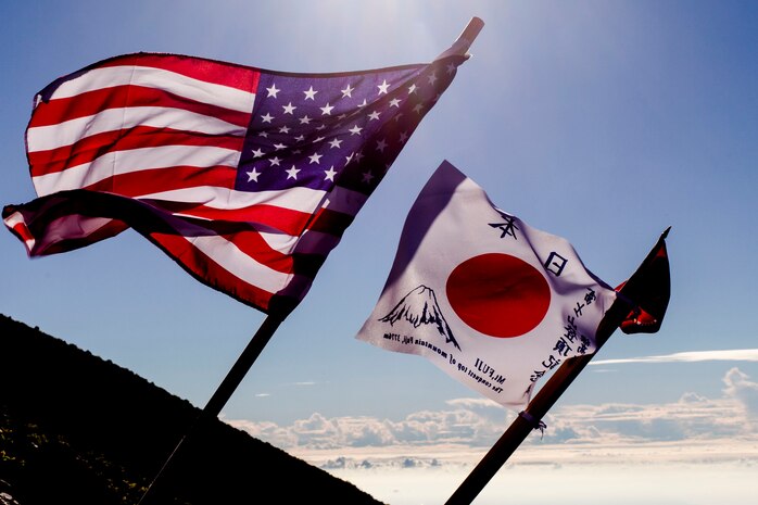 U.S. Marines with Marine Wing Support Squadron (MWSS) 171, based out of Marine Corps Air Station Iwakuni, hiked up Mount Fuji, Japan, as part of a unit activity July 31, 2016. Marines within the squadron first conquered Mount Fuji with a 3,776 meter climb to the peak. Marines bought ‘Kongo-Tsue’ walking sticks and had stamps burned onto them, which signified the location and altitude throughout 10 stations located up the trail.. Holding events like these provides Marines with a sense of closure after a month of hard work during the exercise. (U.S. Marine Corps photo by Lance Cpl. Aaron Henson)