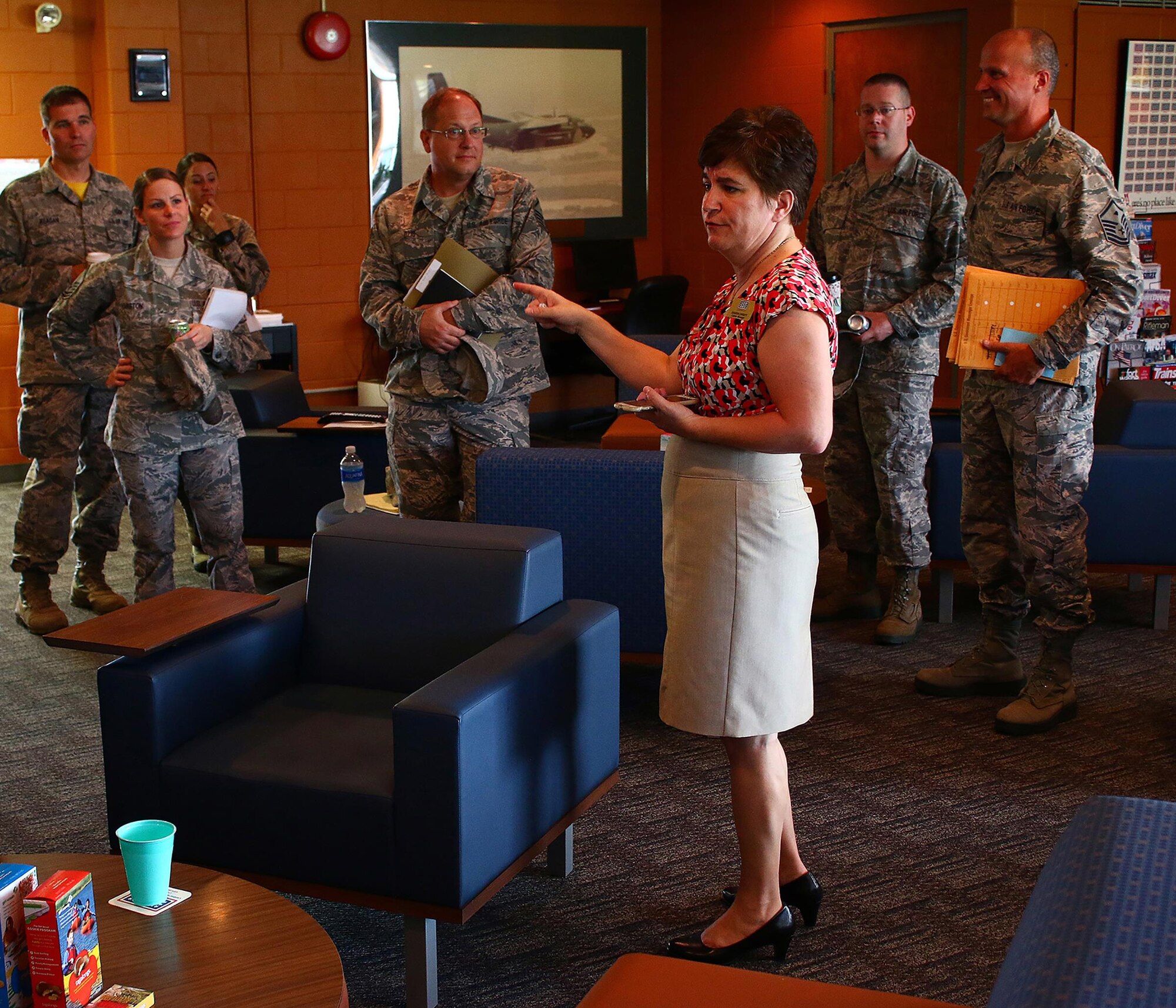 Sharon Christy, center manager of the Wright-Patterson Air Force Base United Service Organizations (USO), gives a tour of the facility to the 445th Airlift Wing First Sergeants Council July 16, 2016. The USO is available to all branches of the military, Guard and Reserve, spouses, and family members.