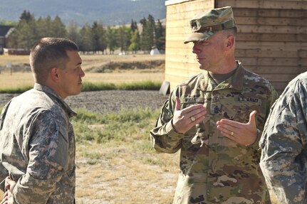 U.S. Army Reserve Command, Command Sergeant Major (Interim), Command Sgt. Maj. James P. Wills speaks with Spc. Michael S. Orozco, USARC 2016 Best Warrior winner in the Soldier category after an obstacle course training at Fort Harrison, MT, August 5, 2016. The USARC BWC winners from the noncommissioned officer and Soldier category are going through rigorous training, leading up to their appearance at Fort A.P. Hill later this year for the Department of Army BWC. (U.S. Army Reserve photo by  Brian Godette, USARC Public Affairs)