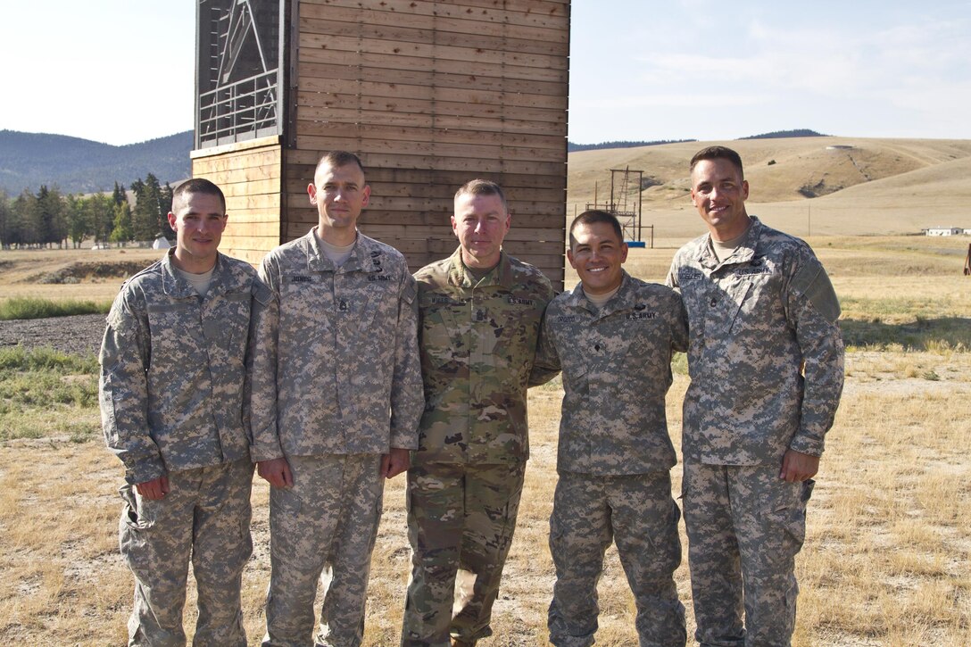 U.S. Army Reserve Command, Command Sergeant Major (Interim), Command Sgt. Maj. James P. Wills poses with the USARC Best Warrior winners and runner-ups from the 2016 BWC competition after an obstacle course training at Fort Harrison, MT, August 5, 2016. The USARC BWC winners from the noncommissioned officer and Soldier category are going through rigorous training, leading up to their appearance at Fort A.P. Hill later this year for the Department of Army BWC. (U.S. Army Reserve photo by  Brian Godette, USARC Public Affairs)