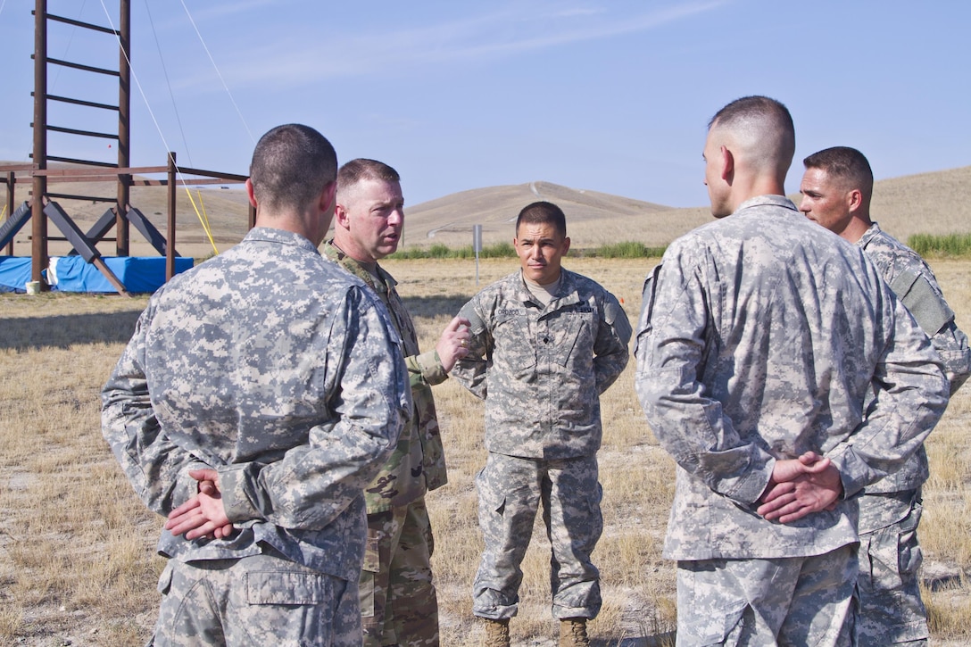 U.S. Army Reserve Command, Command Sergeant Major (Interim), Command Sgt. Maj. James P. Wills speaks with the USARC Best Warrior winners and runner-ups from the 2016 BWC competition after an obstacle course training at Fort Harrison, MT, August 5, 2016. The USARC BWC winners from the noncommissioned officer and Soldier category are going through rigorous training, leading up to their appearance at Fort A.P. Hill later this year for the Department of Army BWC. (U.S. Army Reserve photo by  Brian Godette, USARC Public Affairs)