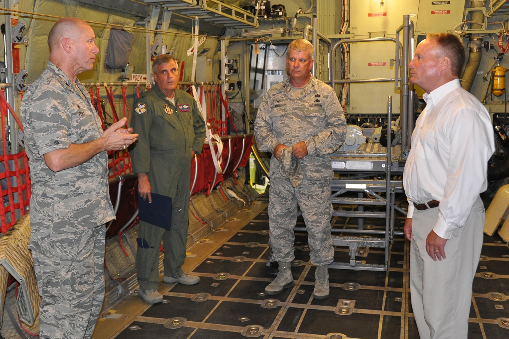 Col. David Post (right), commander of the 910th Maintenance Group, based here, talks about aircraft maintenance operations with U.S. Congressman David Joyce (right) of Ohio’s 14th district on the cargo deck of a C-130H Hercules aircraft in a hangar here, August 4, 2016. 910th Operations Group Commander Col. Bill Phillips (middle left) and 910th Mission Support Group Commander Col. Donald Wren listen to Post’s briefing. They also had the opportunity to talk with Joyce about their respective group’s missions. The congressman visited YARS to learn more about the wing’s capabilities and the installation’s features firsthand as well as meet some of the Citizen Airmen assigned here. (U.S. Air Force photo/Master Sgt. Bob Barko Jr.)