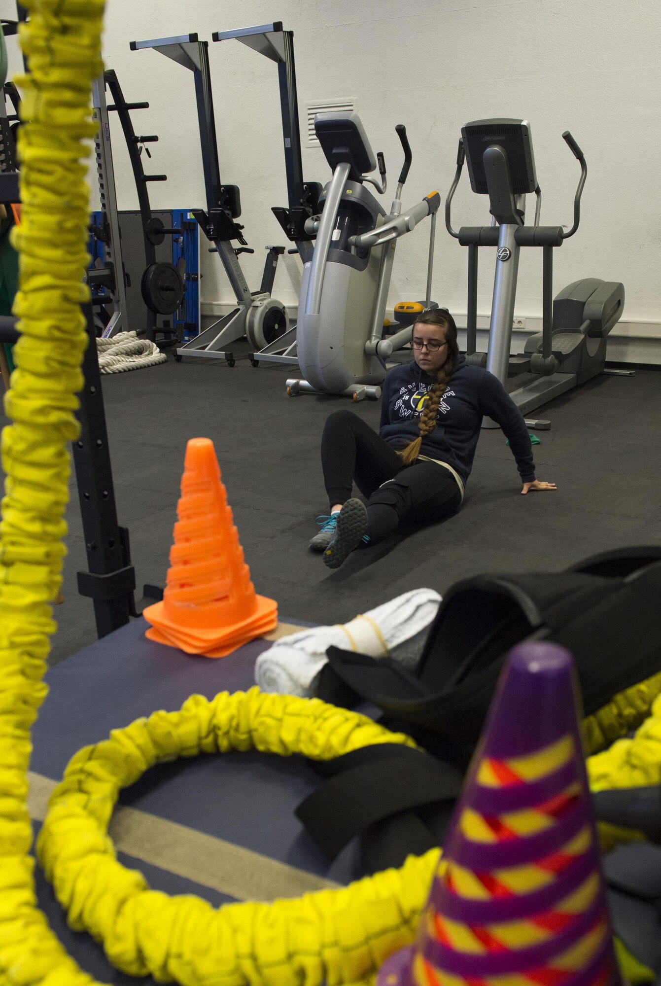 Senior Airman Larissa Greatwood, 86th Public Affairs photojournalist, performs leg raises during a knee rehabilitation class at Ramstein Air Base, Germany, and Aug. 2, 2017. Patrons must receive a consult from an 86th Medical Operations Squadron physical therapist to attend a knee or back rehabilitation class. (U.S. Air Force photo/ Senior Airman Nesha Humes)