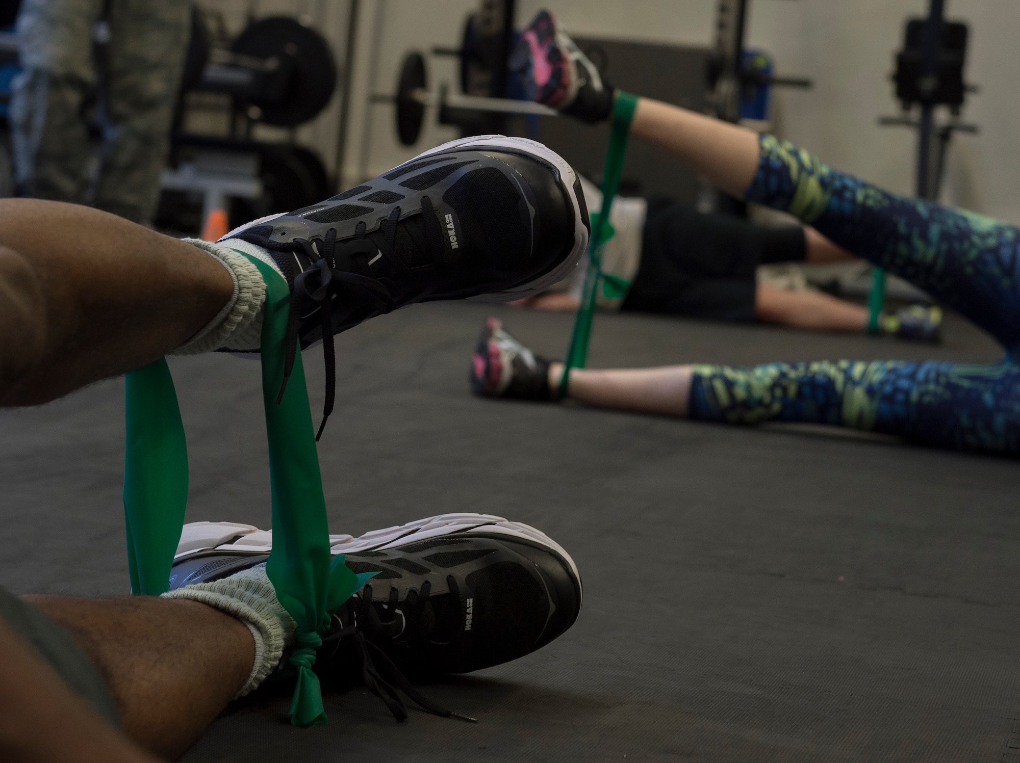Master Sgt. Kendrick Lucas, left, 86th Security Forces Squadron flight chief, performs exercises during a knee rehabilitation class at Ramstein Air Base, Germany, Aug. 2, 2016. The 86th Medical Operations Squadron Physical Therapy Clinic hosts the knee and back rehabilitation classes, which aim to instruct patrons on proper forms to strengthen and heal chronic or acute injuries. (U.S. Air Force photo/ Senior Airman Nesha Humes)