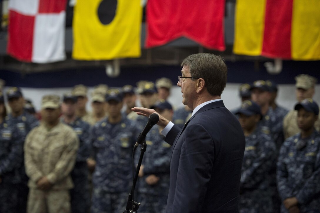 Defense Secretary Ash Carter talks with U.S. sailors and Marines aboard the USS San Antonio shortly after the ship's arrival in Tallinn, Estonia, June 23, 2015. Carter is traveling in Europe to hold bilateral and multilateral meetings with European defense ministers and to participate in his first NATO ministerial as secretary of defense. DoD photo by Air Force Master Sgt. Adrian Cadiz <br /><br /><a target="_blank" href="https://www.flickr.com/photos/secdef"> Click
here to see more images on Secretary Carter's Flickr page. </a>
