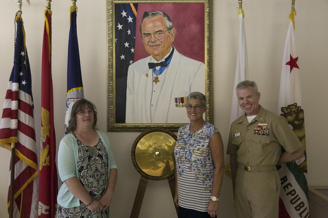 Cap. John Lamberton, commanding officer, Robert E. Bush Naval Hospital, Twentynine Palms, Calif., met with Mrs. D'Arcy Neller, wife of Commandant of the Marine Corps Gen. Robert B. Neller, and Mrs. Vicki Mullen, wife of Brigadier Gen. William F. Mullen, commanding general, Marine Corps Air Ground Combat Center, Twentynine Palms, Calif., on a tour of the Robert E. Bush Naval Hospital during Mrs. Neller's visit to the Combat Center, July 28, 2016. (Official Marine Corps photo by Lance Cpl. Dave Flores/Released)