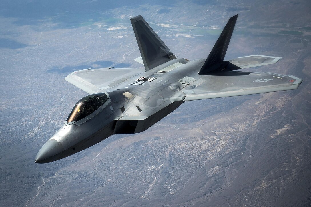 An F-22 Raptor flies by after receiving fuel from a KC-135 Stratotanker during exercise Red Flag 16-3 over Nellis Air Force Base, Nev., July 27, 2016. Air Force photo by Tech. Sgt. David Salanitri