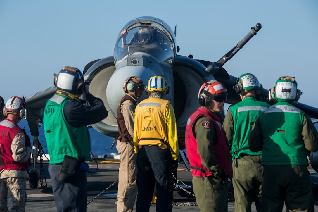 Marines with 22nd Marine Expeditionary Unit (MEU), prepare an AV-8B Harrier II for launch on the flight deck of the amphibious assault ship USS Wasp (LHD 1) Aug. 1, 2016. 22nd MEU, embarked on the Wasp is conducting precision air strikes in support of the Libyan Government of National Accord-aligned forces against Daesh targets in Sirte, Libya as part of Operation Odyssey Lightning.