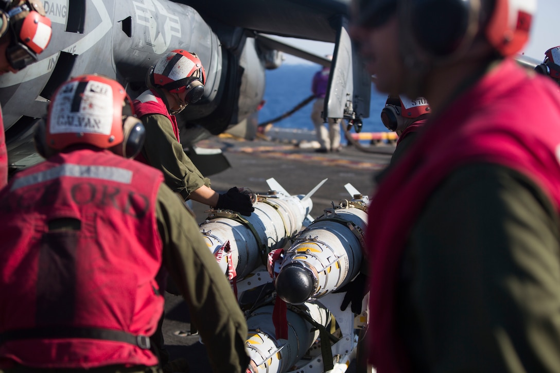 Marines with 22nd Marine Expeditionary Unit (MEU), prepare an AV-8B Harrier II for launch on the flight deck of the amphibious assault ship USS Wasp (LHD 1) Aug. 1, 2016. 22nd MEU, embarked on the Wasp is conducting precision air strikes in support of the Libyan Government of National Accord-aligned forces against Daesh targets in Sirte, Libya as part of Operation Odyssey Lightning.