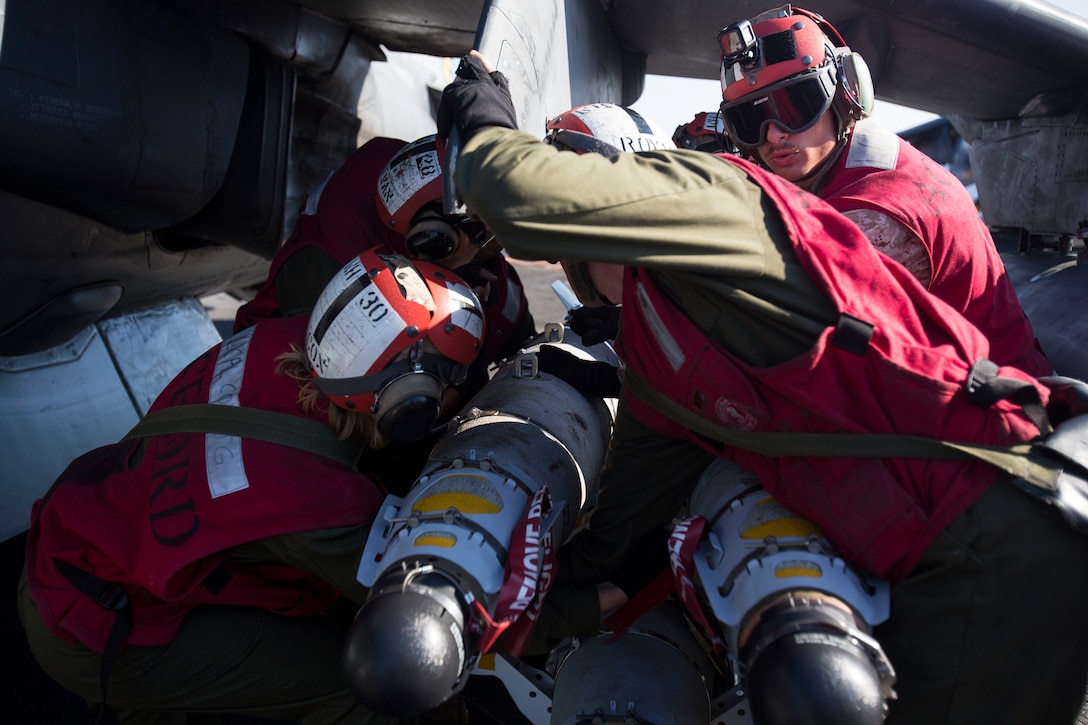 Marines with Marine Medium Tiltrotor Squadron 264 (Reinforced), 22nd Marine Expeditionary Unit (MEU), load ordnance onto an AV-8B Harrier II on the flight deck of the amphibious assault ship USS Wasp (LHD 1) Aug. 1, 2016. 22nd Marine Expeditionary Unit (MEU), embarked on the USS Wasp (LHD 1), is conducting precision air strikes in support of the Libyan Government of National Accord-aligned forces against Daesh targets in Sirte, Libya as part of Operation Odyssey Lightning.