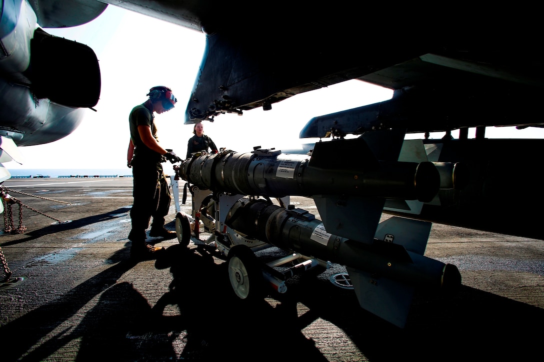 Marines with Marine Medium Tiltrotor Squadron 264 (Reinforced), 22nd Marine Expeditionary Unit (MEU), load ordnance on an AV-8B Harrier II on the flight deck of the amphibious assault ship USS Wasp (LHD-1) Aug. 2, 2016. At the request of the Libyan Government of National Accord (GNA), the 22nd MEU is conducting precision airstrikes against ISIL targets in Sirte, Libya, to support GNA-affiliated forces seeking to defeat ISIL in its primary stronghold in Libya.