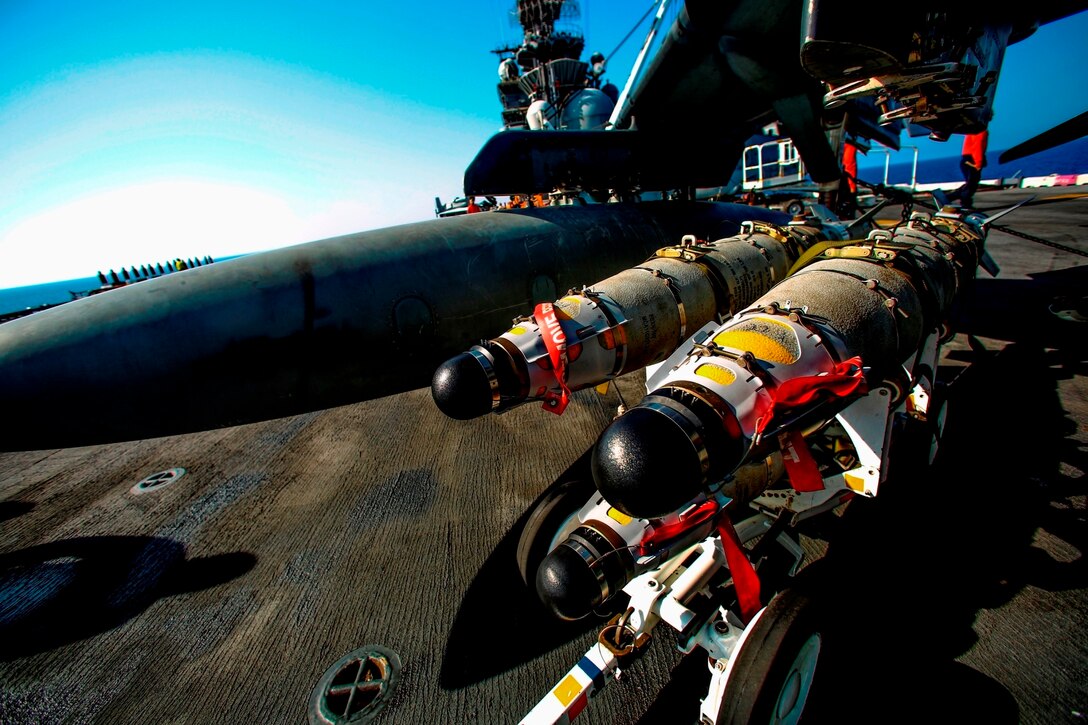 Marines with Marine Medium Tiltrotor Squadron 264 (Reinforced), 22nd Marine Expeditionary Unit (MEU), load ordnance on an AV-8B Harrier II on the flight deck of the amphibious assault ship USS Wasp (LHD-1) Aug. 2, 2016. At the request of the Libyan Government of National Accord (GNA), the 22nd MEU is conducting precision airstrikes against ISIL targets in Sirte, Libya, to support GNA-affiliated forces seeking to defeat ISIL in its primary stronghold in Libya.