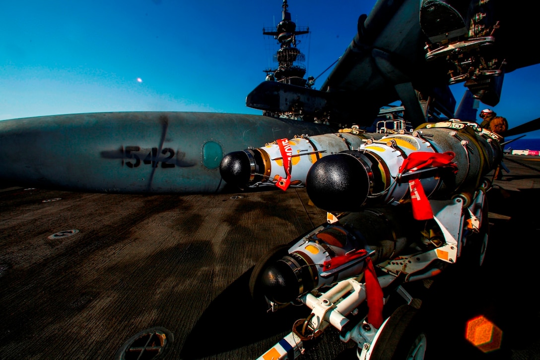 Marines with Marine Medium Tiltrotor Squadron 264 (Reinforced), 22nd Marine Expeditionary Unit (MEU), load ordnance on an AV-8B Harrier II on the flight deck of the amphibious assault ship USS Wasp (LHD-1) Aug. 2, 2016. At the request of the Libyan Government of National Accord (GNA), the 22nd MEU is conducting precision airstrikes against ISIL targets in Sirte, Libya, to support GNA-affiliated forces seeking to defeat ISIL in its primary stronghold in Libya.