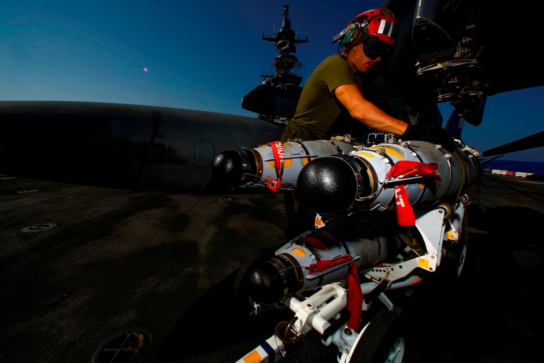 Marines with Marine Medium Tiltrotor Squadron 264 (Reinforced), 22nd Marine Expeditionary Unit (MEU), load ordnance on an AV-8B Harrier II on the flight deck of the amphibious assault ship USS Wasp (LHD-1) Aug. 2, 2016. At the request of the Libyan Government of National Accord (GNA), the 22nd MEU is conducting precision airstrikes against ISIL targets in Sirte, Libya, to support GNA-affiliated forces seeking to defeat ISIL in its primary stronghold in Libya.